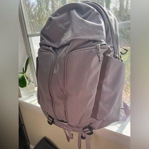 Women lavender NorthFace Surge backpack